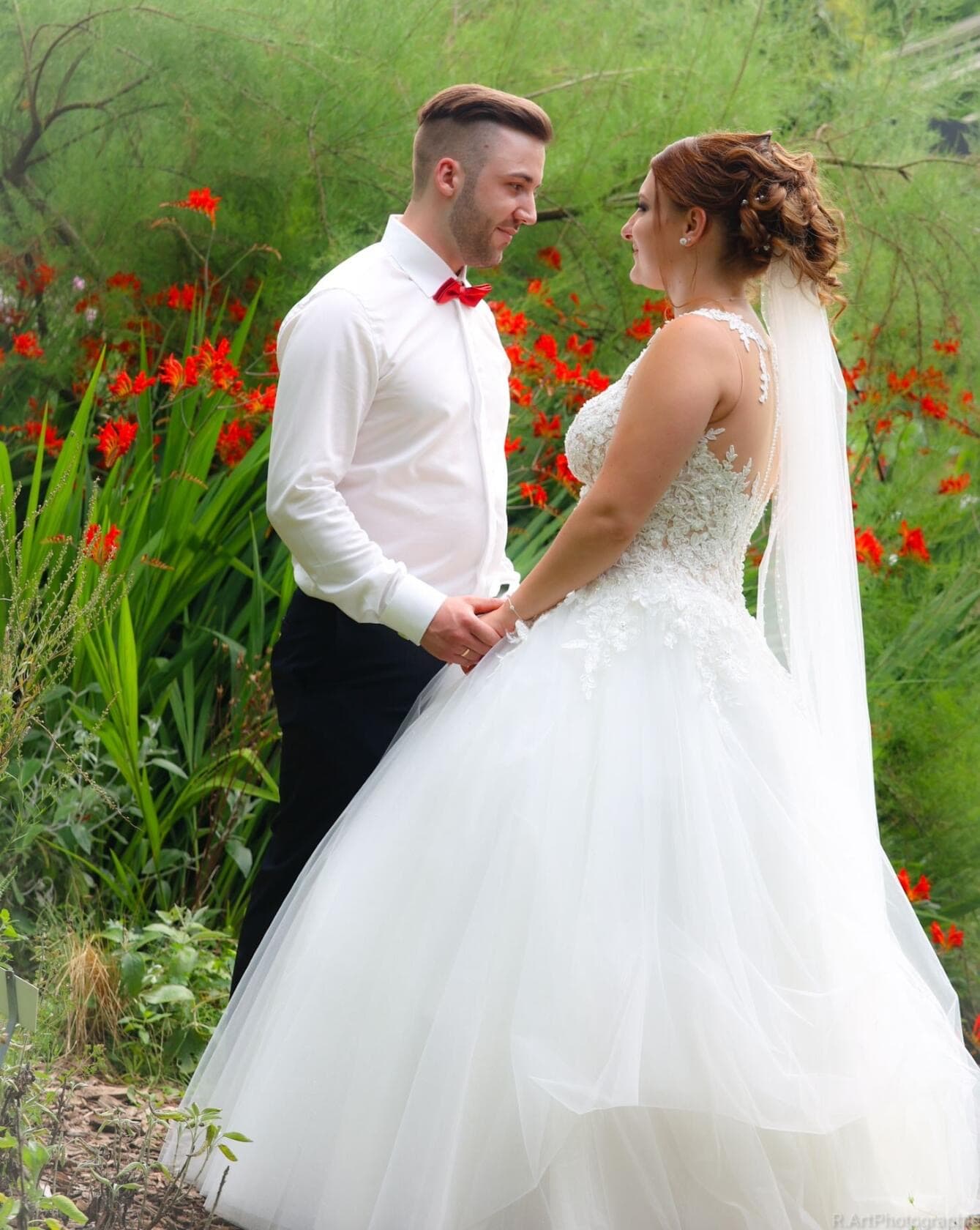 Hochzeitsfotografie im Allgäu: Braut im Mohnfeld